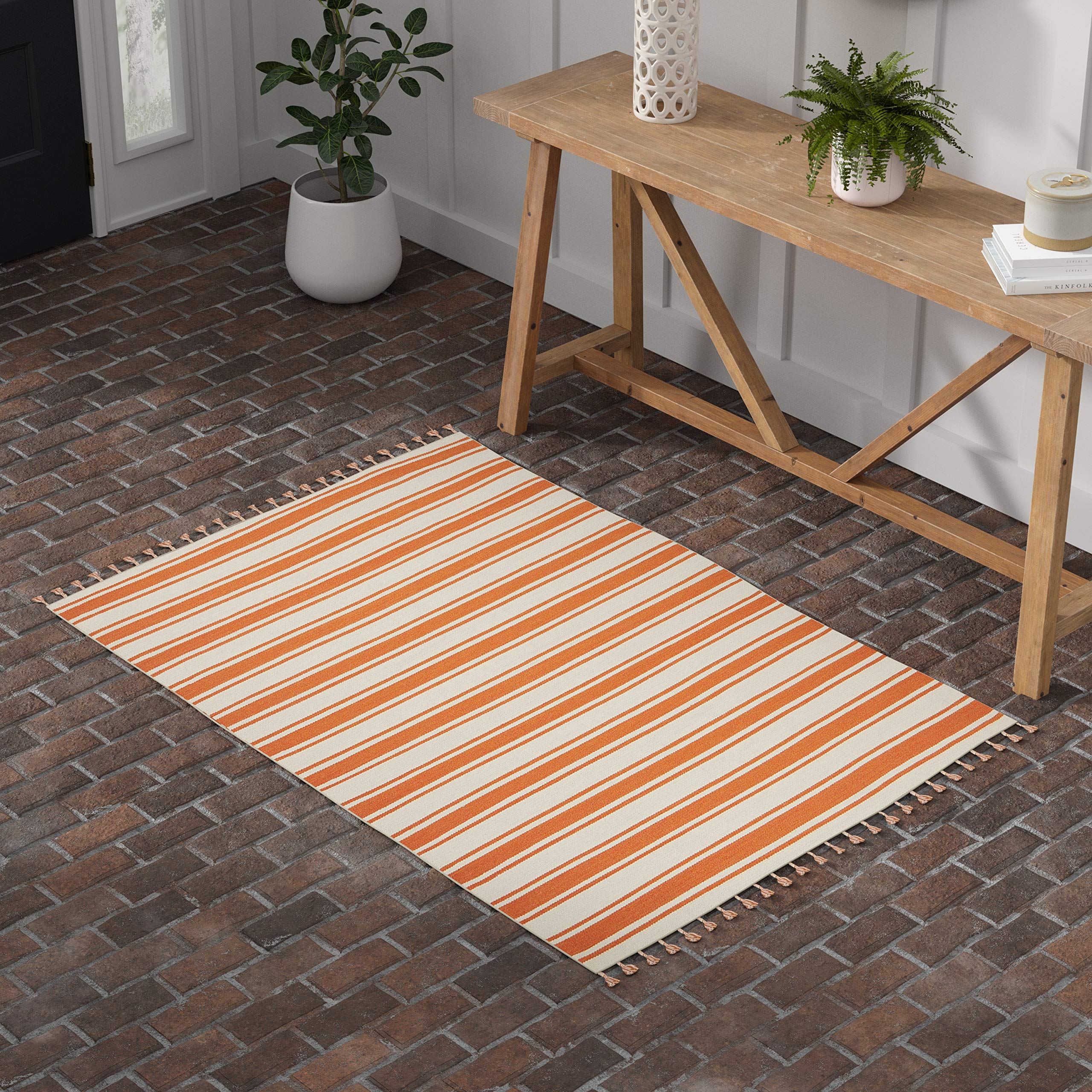 Amazon Brand – Stone & Beam Los Altos Striped Dhurrie Farmhouse Area Rug, 4' x 6' 6", Orange and Ivory