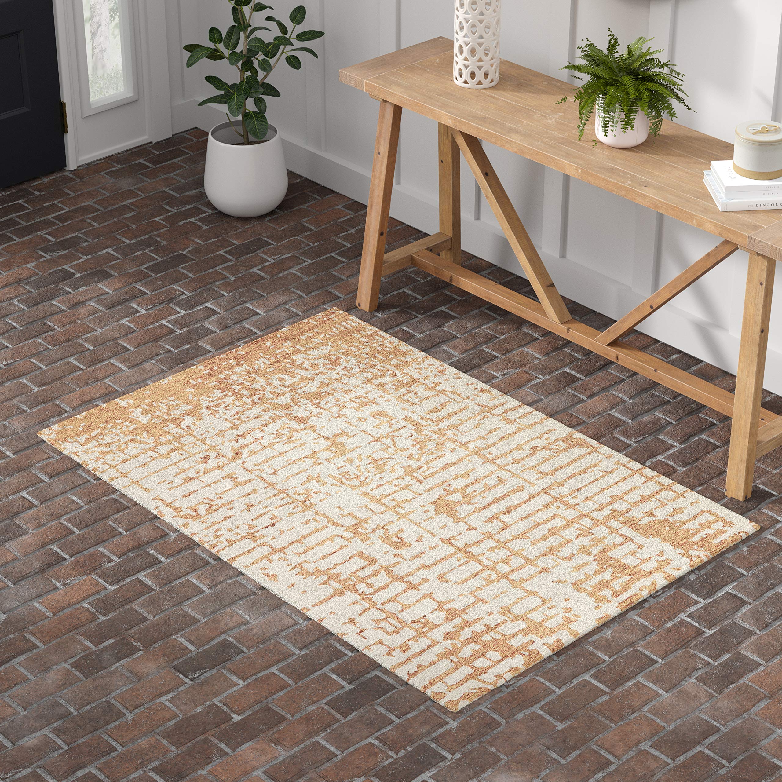 Amazon Brand – Stone & Beam Distressed Handtufted Cotton and Wool Area Rug 4' x 6', Gold and Cream