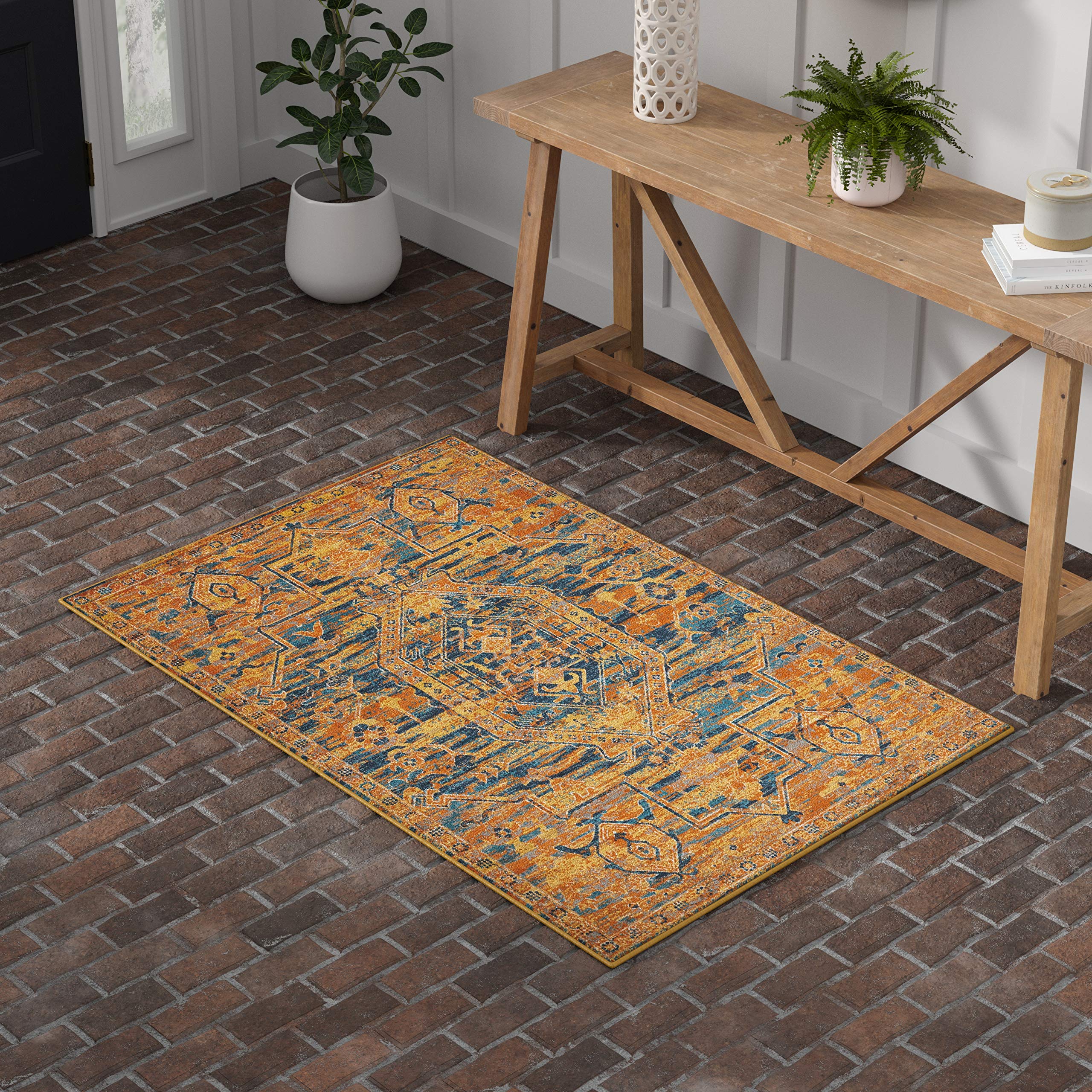 Amazon Brand – Stone & Beam Old World Area Rug, 3' 9" x 5' 9", Blue and Orange