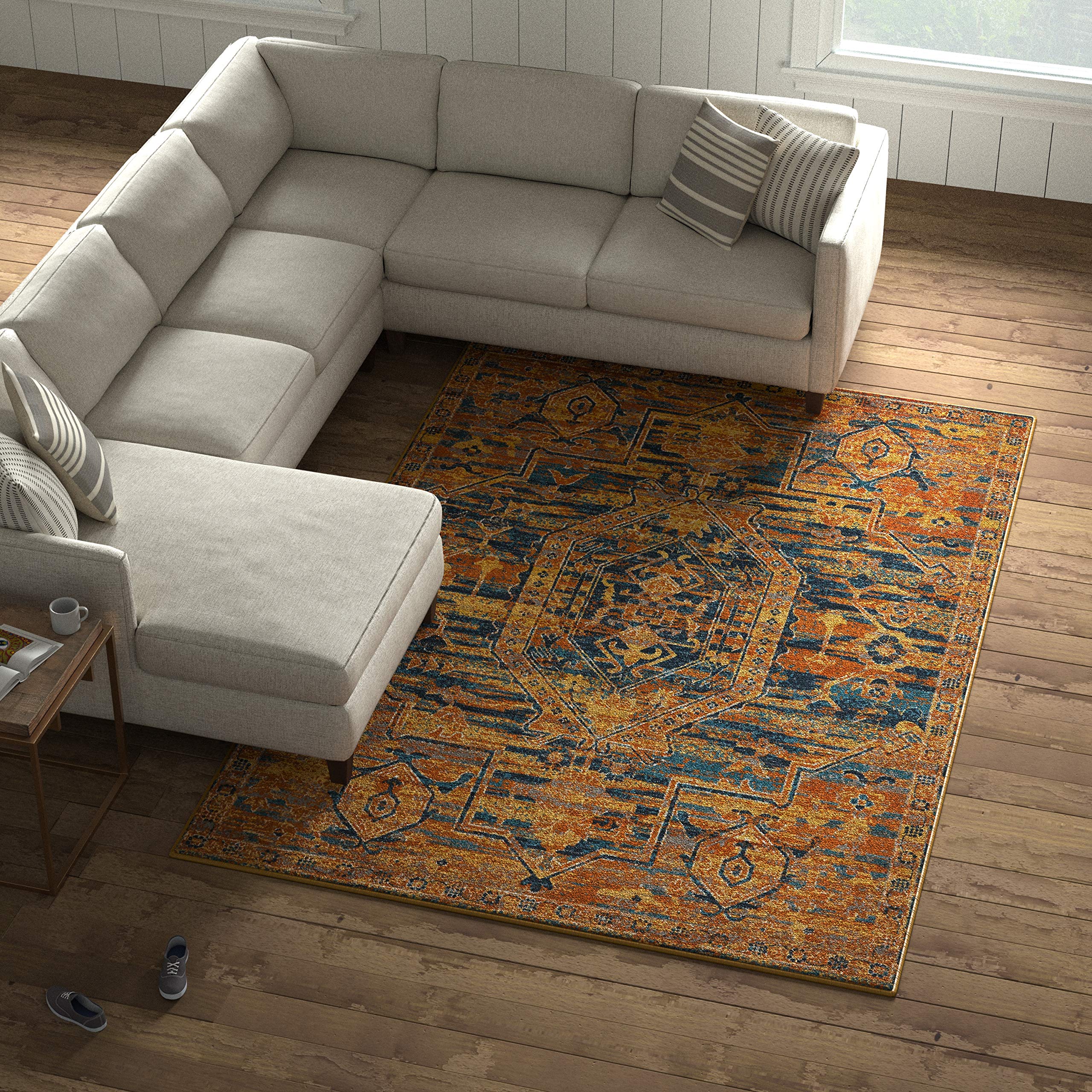 Amazon Brand – Stone & Beam Old World Area Rug, 6' 7" x 9' 6", Blue and Orange